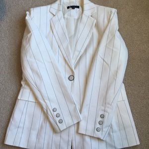 Black and white pinstriped suit